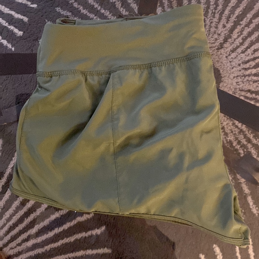 Nike Drifit running shorts in sage green